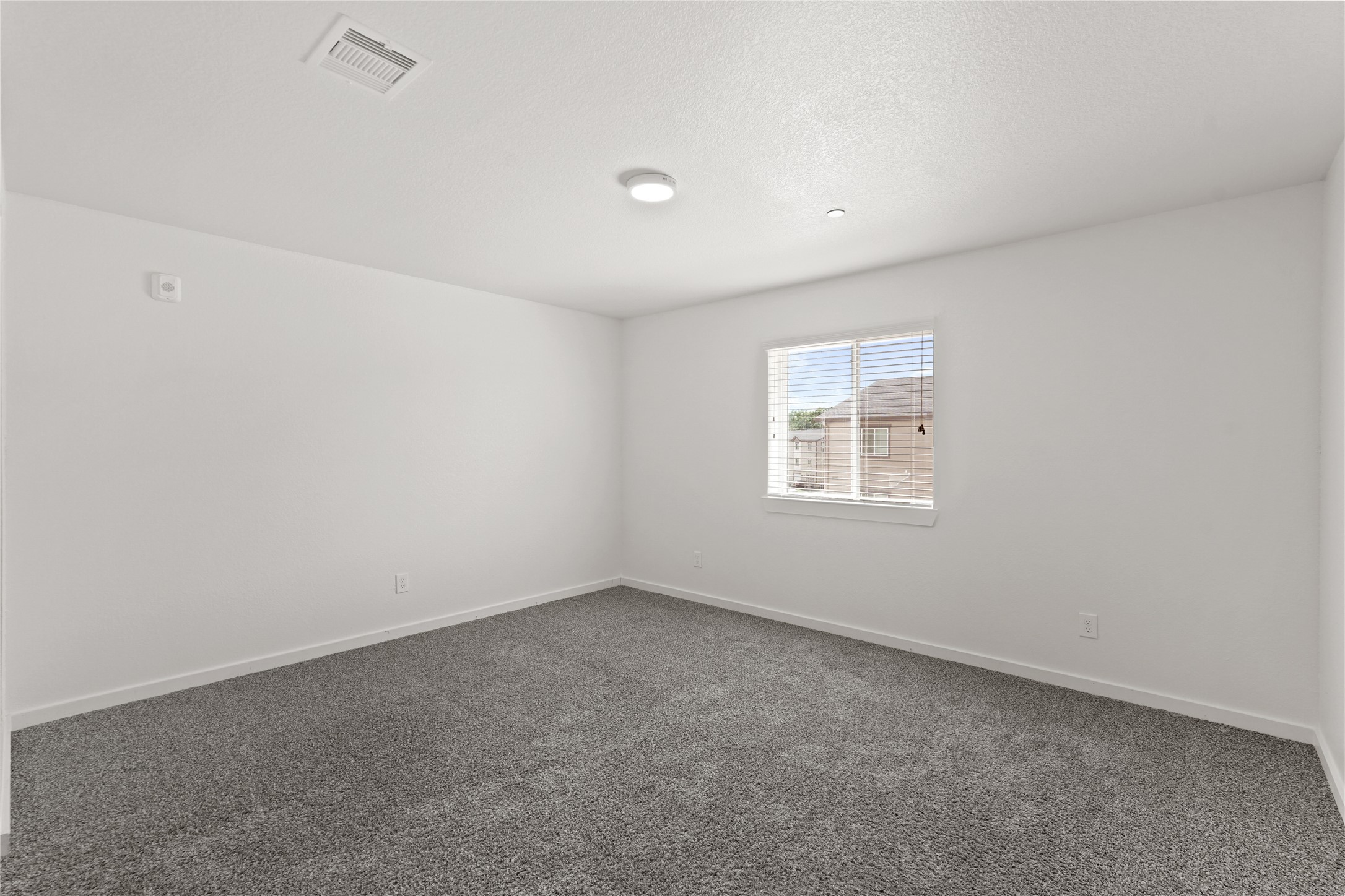 12603 Telge Road, Unit 7L Cypress, TX 77429 - Photo 5 of 20 a view of an empty room with a window