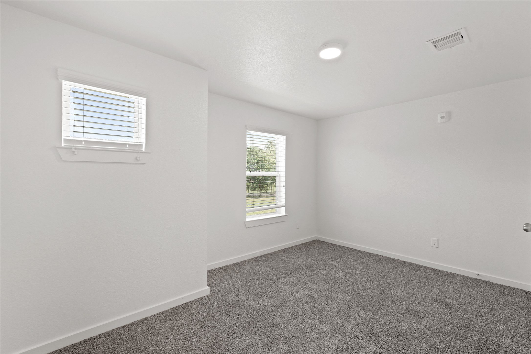 12603 Telge Road, Unit 7L Cypress, TX 77429 - Photo 7 of 20 a view of an empty room with a window