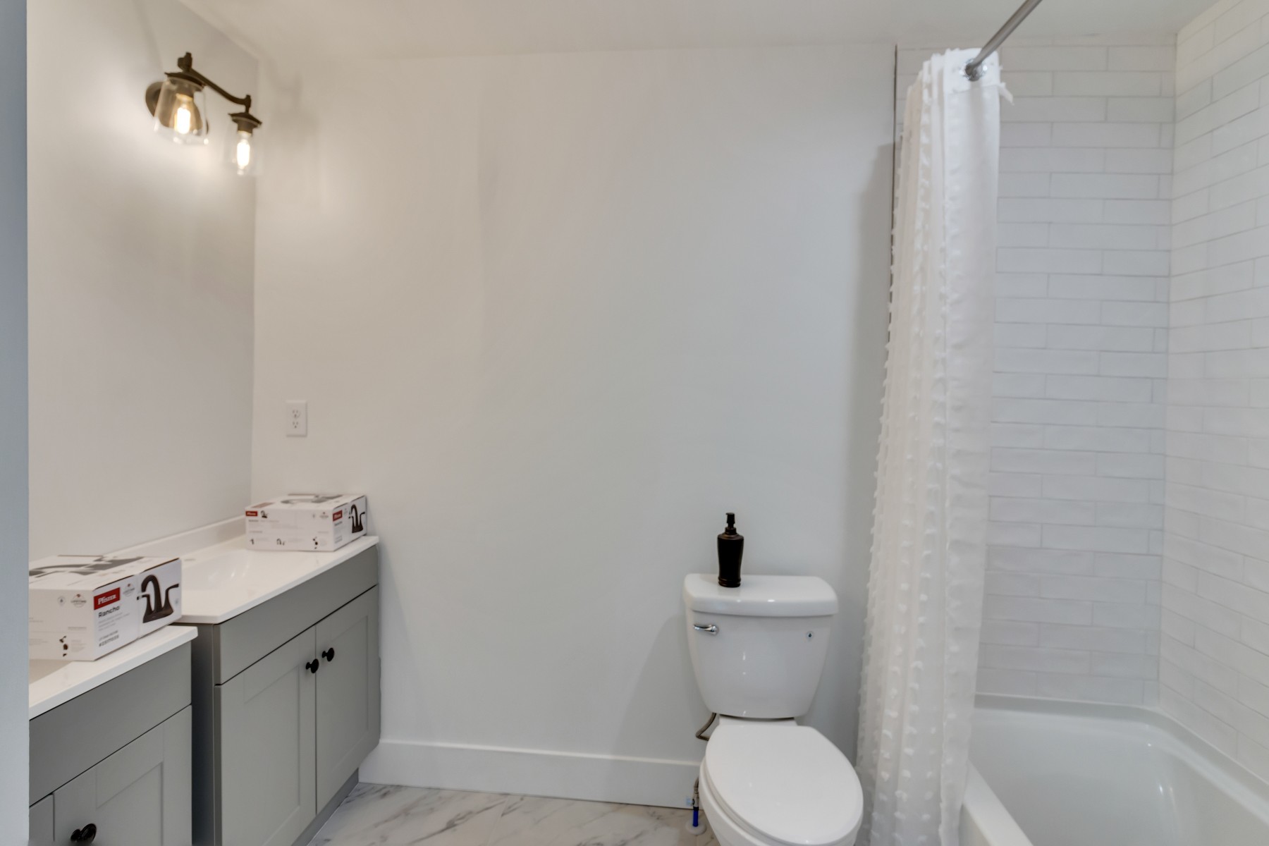 4778 Drakes Branch Road Nashville, TN 37218 - Photo 11 of 17 a bathroom with a toilet sink and mirror