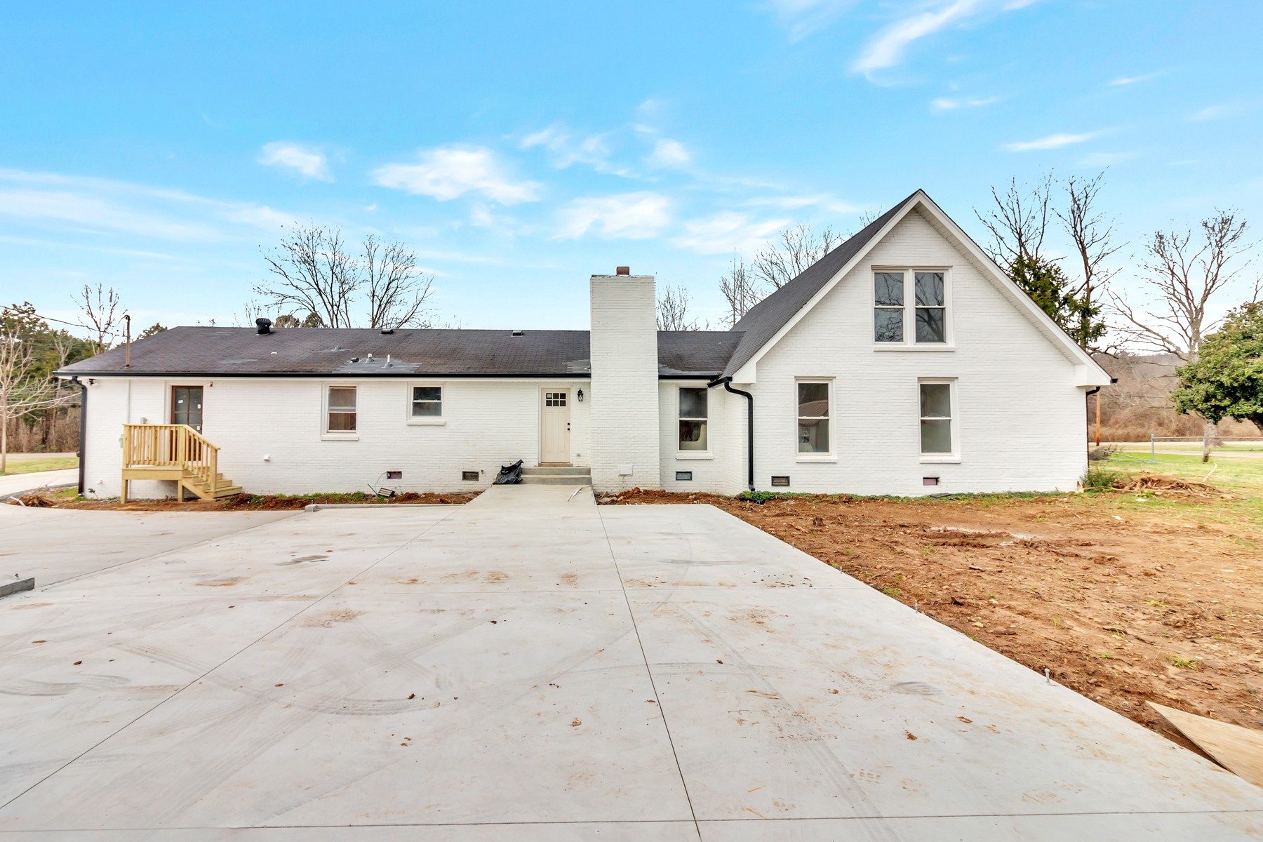 4778 Drakes Branch Road Nashville, TN 37218 - Photo 16 of 17 a view of white house with a wooden space