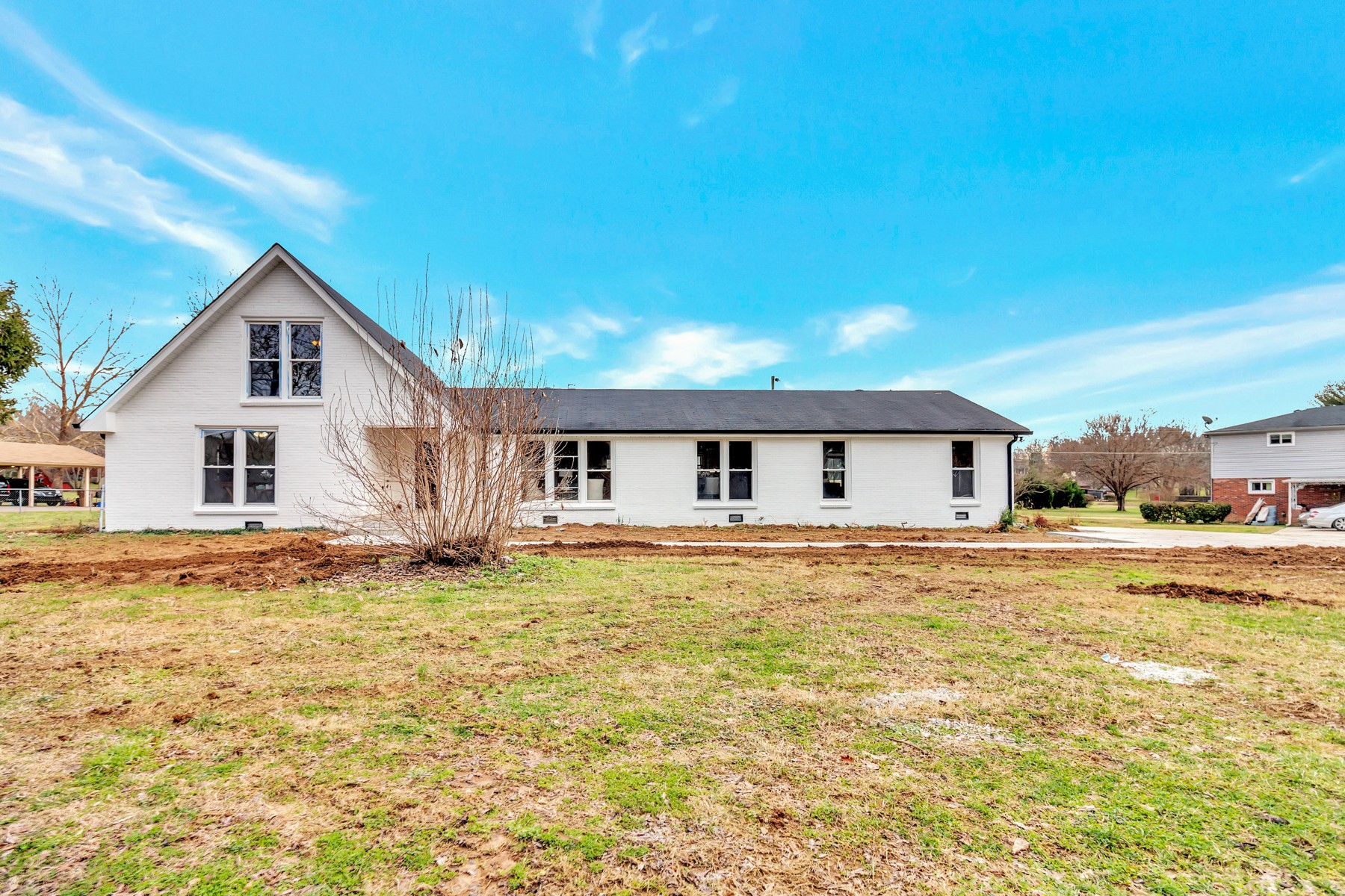 4778 Drakes Branch Road Nashville, TN 37218 - Photo 17 of 17 a big house with a big yard and large trees
