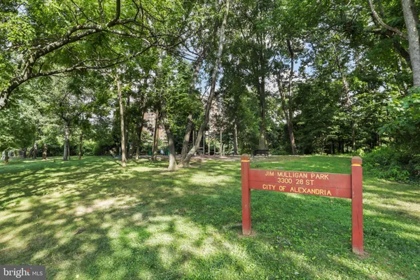 a view of a balcony with furniture and city view