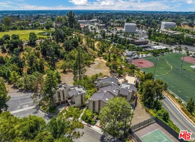 a view of swimming pool from balcony