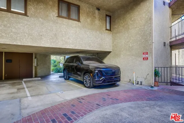a kitchen with counter top space cabinets and stainless steel appliances