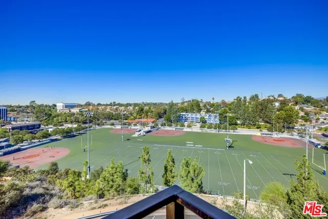 a view of a city with a lake