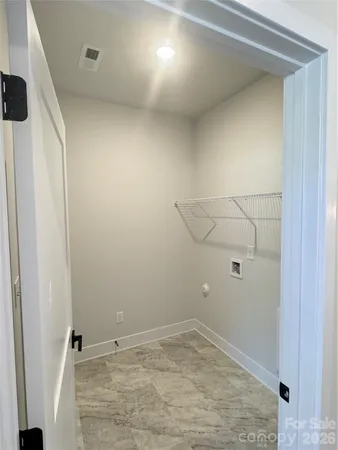 an empty room with an entryway