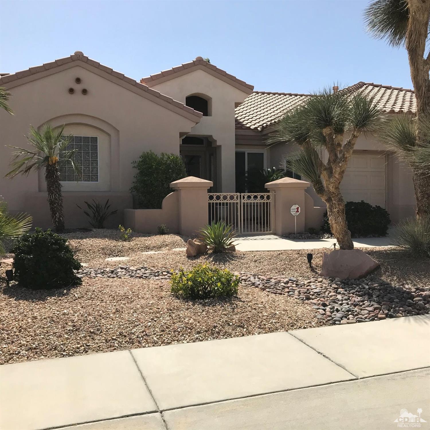 78121 Hunter Point Road Palm Desert, CA 92211 - Photo 1 of 12 a view of a house with a outdoor space