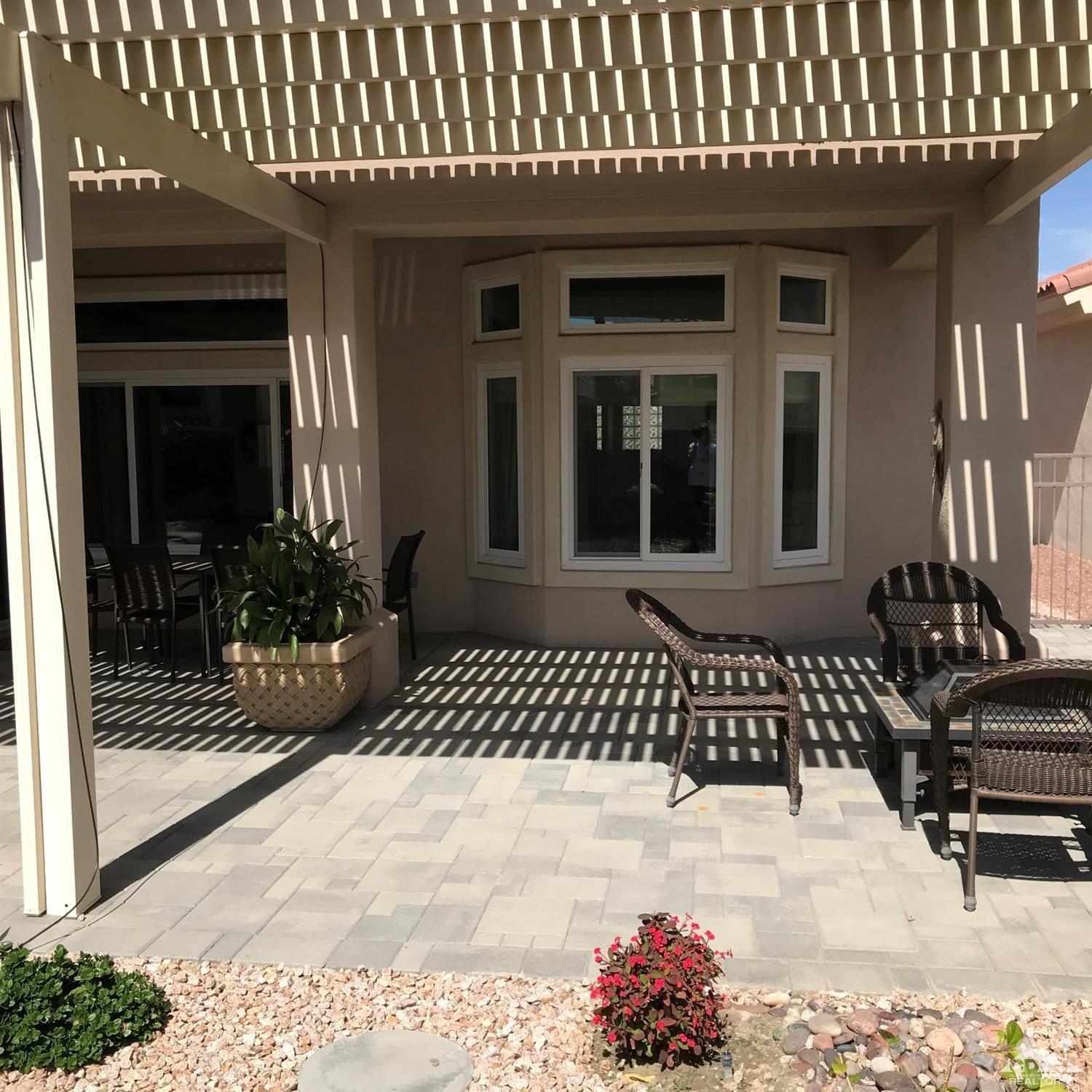 78121 Hunter Point Road Palm Desert, CA 92211 - Photo 12 of 12 a view of a house with a bench