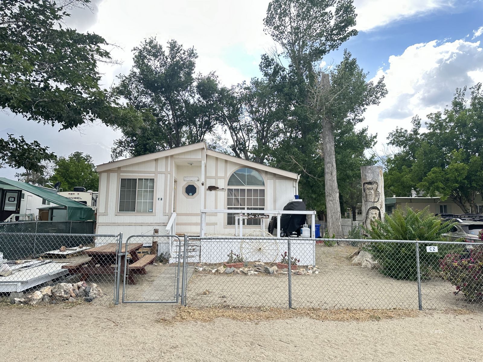 150 Tinnemaha Road, Unit C2 Big Pine, CA 93513 - Photo 11 of 28 a view of a house with a patio