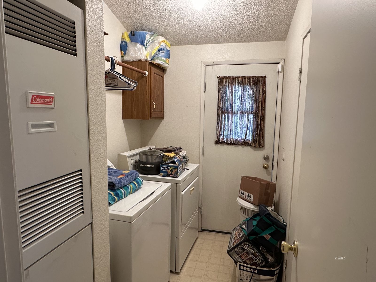 150 Tinnemaha Road, Unit C2 Big Pine, CA 93513 - Photo 12 of 28 a room with storage and utility