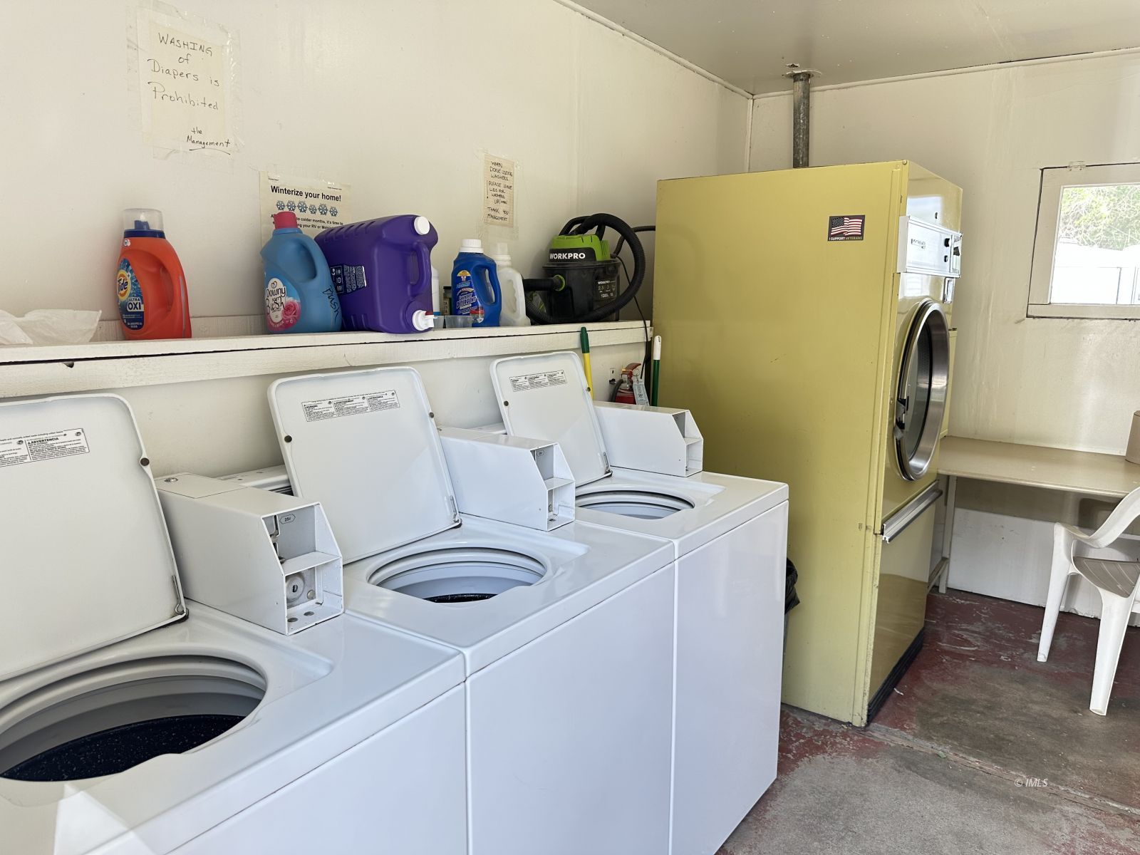 150 Tinnemaha Road, Unit C2 Big Pine, CA 93513 - Photo 21 of 28 a utility room with dryer and washer
