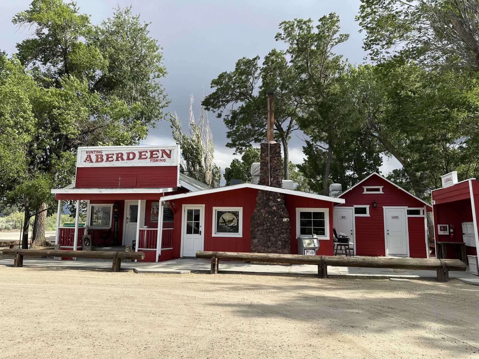 150 Tinnemaha Road, Unit C2 Big Pine, CA 93513 - Photo 23 of 28 a view of a cafe with table and chairs