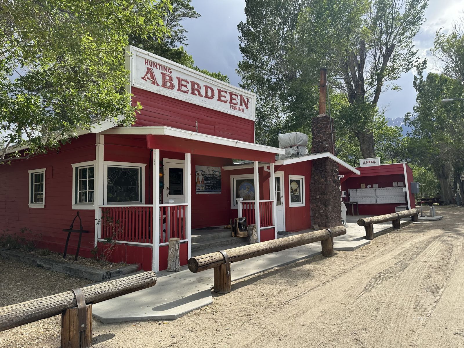 150 Tinnemaha Road, Unit C2 Big Pine, CA 93513 - Photo 25 of 28 a view of a house with a yard and sitting area
