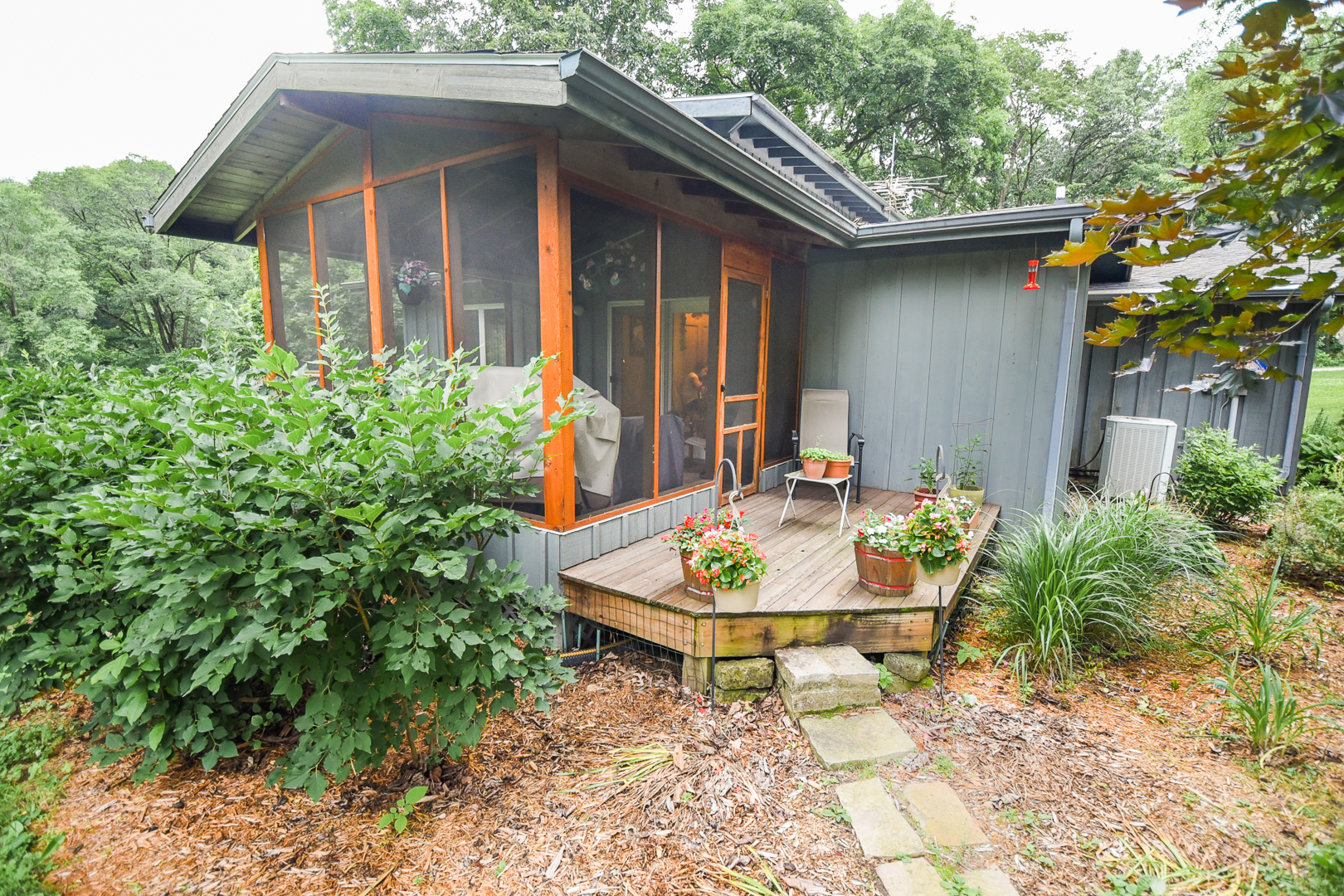 2147 Lowell Park Road Dixon, IL 61021 - Photo 11 of 46 a backyard of a house with table and chairs