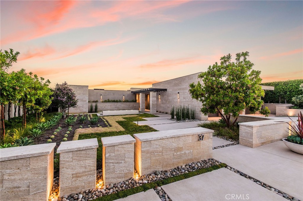 37 Monarch Bay Drive Dana Point, CA 92629 - Photo 1 of 37 a front view of a house with garden