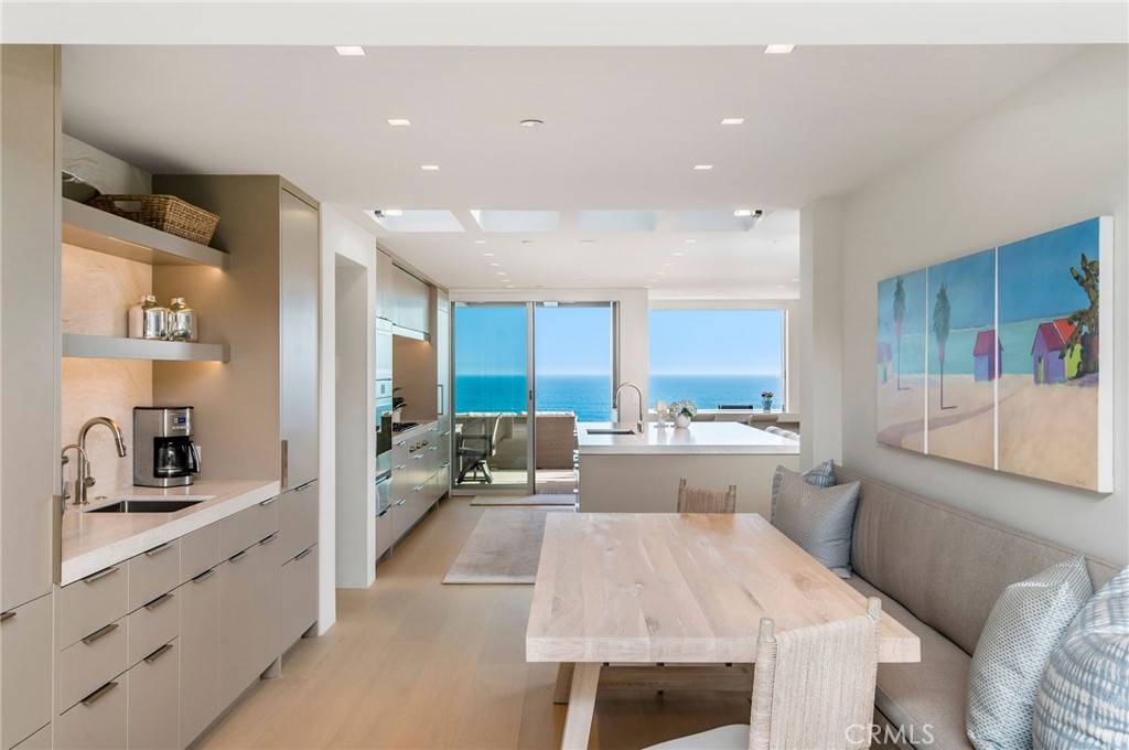 37 Monarch Bay Drive Dana Point, CA 92629 - Photo 12 of 37 a large kitchen with kitchen island a large counter top space a sink stainless steel appliances and cabinets