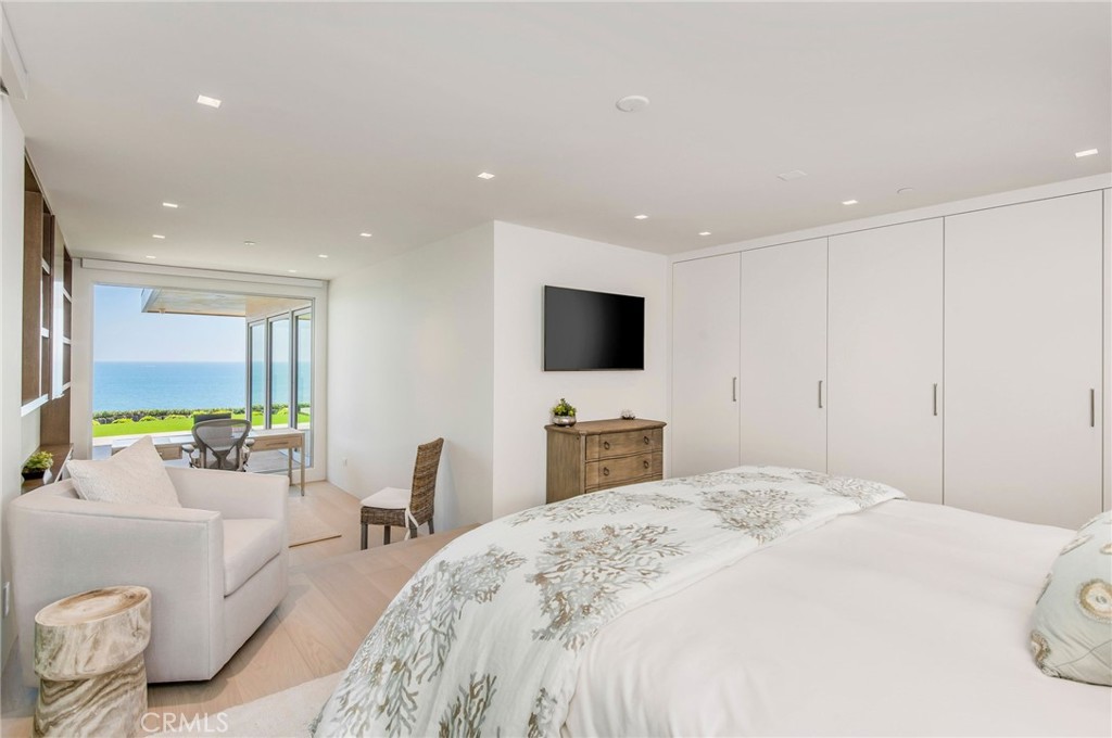 37 Monarch Bay Drive Dana Point, CA 92629 - Photo 15 of 37 a bedroom with a bed and a flat screen tv