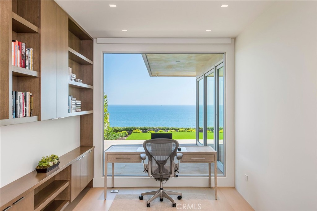 37 Monarch Bay Drive Dana Point, CA 92629 - Photo 16 of 37 a view of a living room with a table and a potted plant