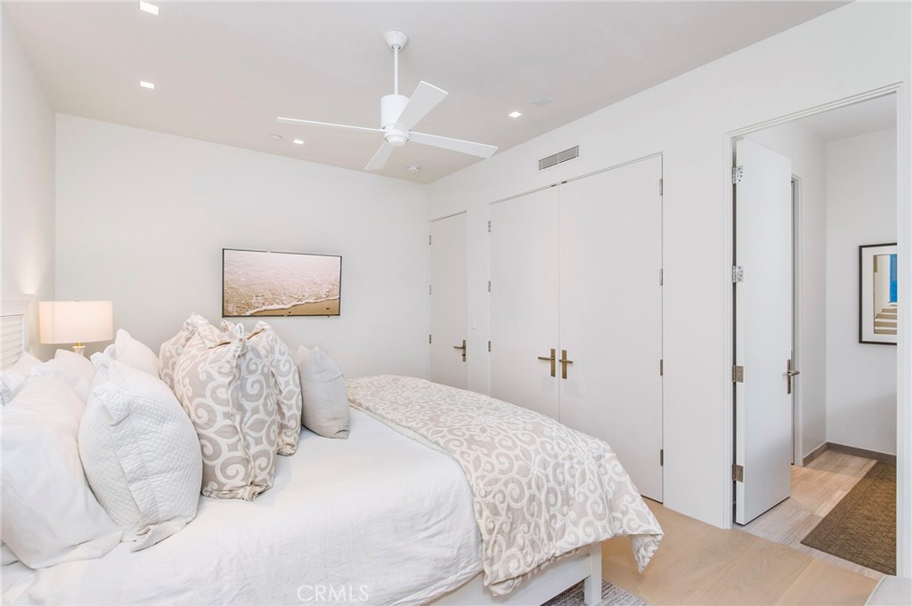 37 Monarch Bay Drive Dana Point, CA 92629 - Photo 22 of 37 a bedroom with a bed and a flat screen tv