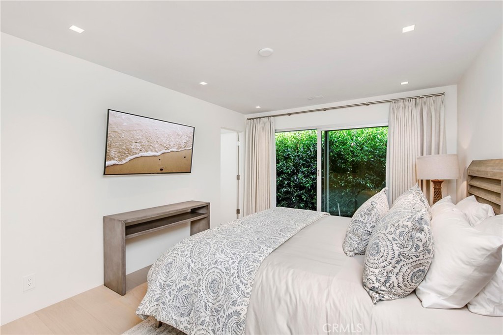 37 Monarch Bay Drive Dana Point, CA 92629 - Photo 24 of 37 a bedroom with a large bed and a large window