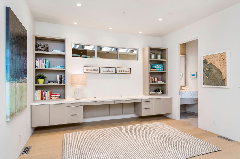 37 Monarch Bay Drive Dana Point, CA 92629 - Photo 25 of 37 a living room with stainless steel appliances lots of furniture and book shelf