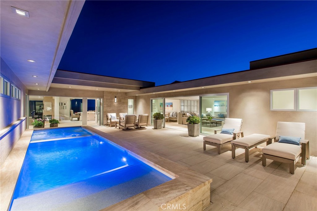 37 Monarch Bay Drive Dana Point, CA 92629 - Photo 28 of 37 a living room with furniture and a large window