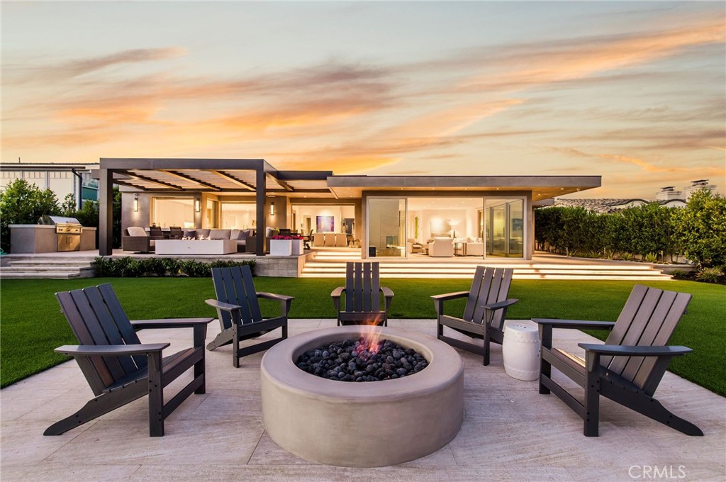 37 Monarch Bay Drive Dana Point, CA 92629 - Photo 30 of 37 a view of a patio with couches potted plants and a swimming pool