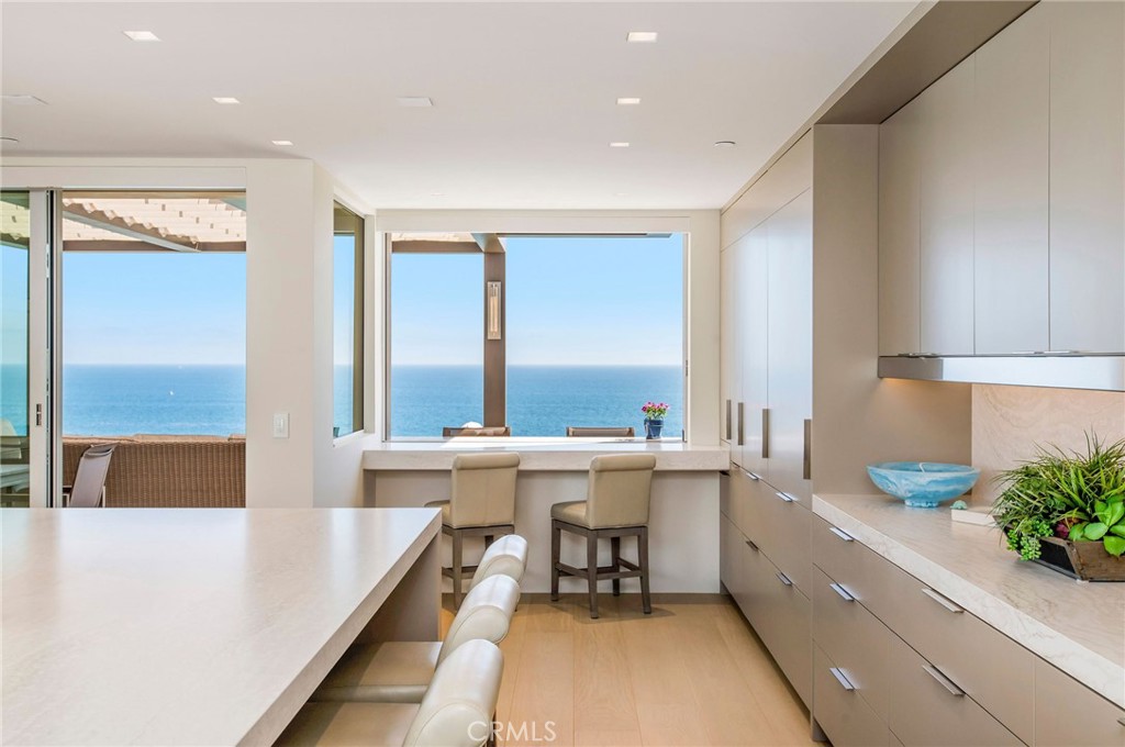 37 Monarch Bay Drive Dana Point, CA 92629 - Photo 10 of 37 a large white kitchen with a large window