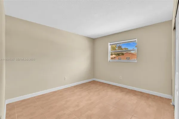 an empty room with a window