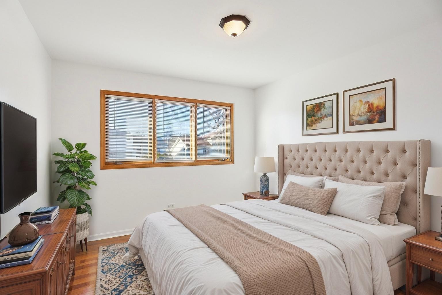 16408 Turner Avenue Markham, IL 60428 - Photo 18 of 24 a bedroom with a bed and a flat screen tv