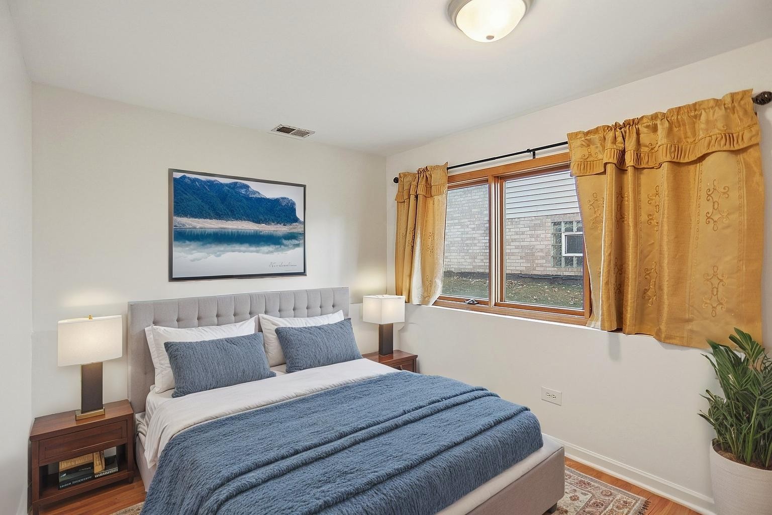 16408 Turner Avenue Markham, IL 60428 - Photo 20 of 24 a bedroom with a bed and a window with chair