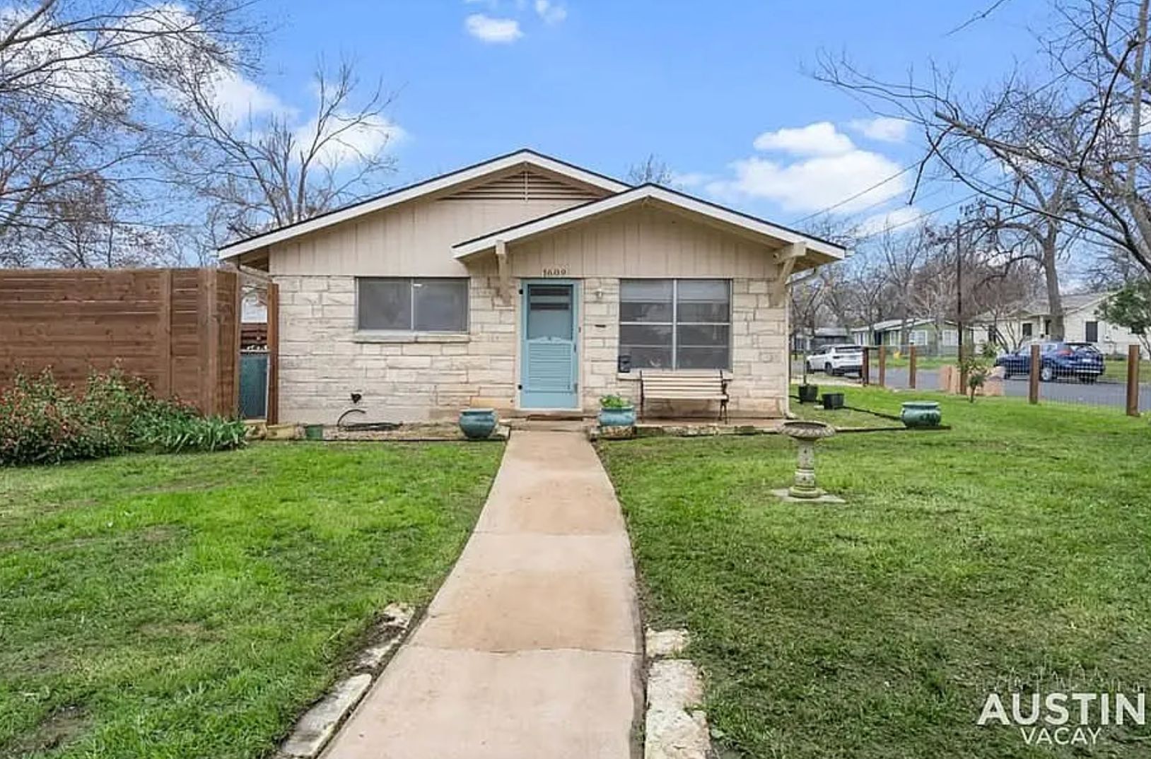 1609 Redd Street, Unit A Austin, TX 78745 - Photo 1 of 1 a front view of house with yard and green space
