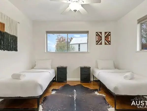 a bedroom with a bed and a chair