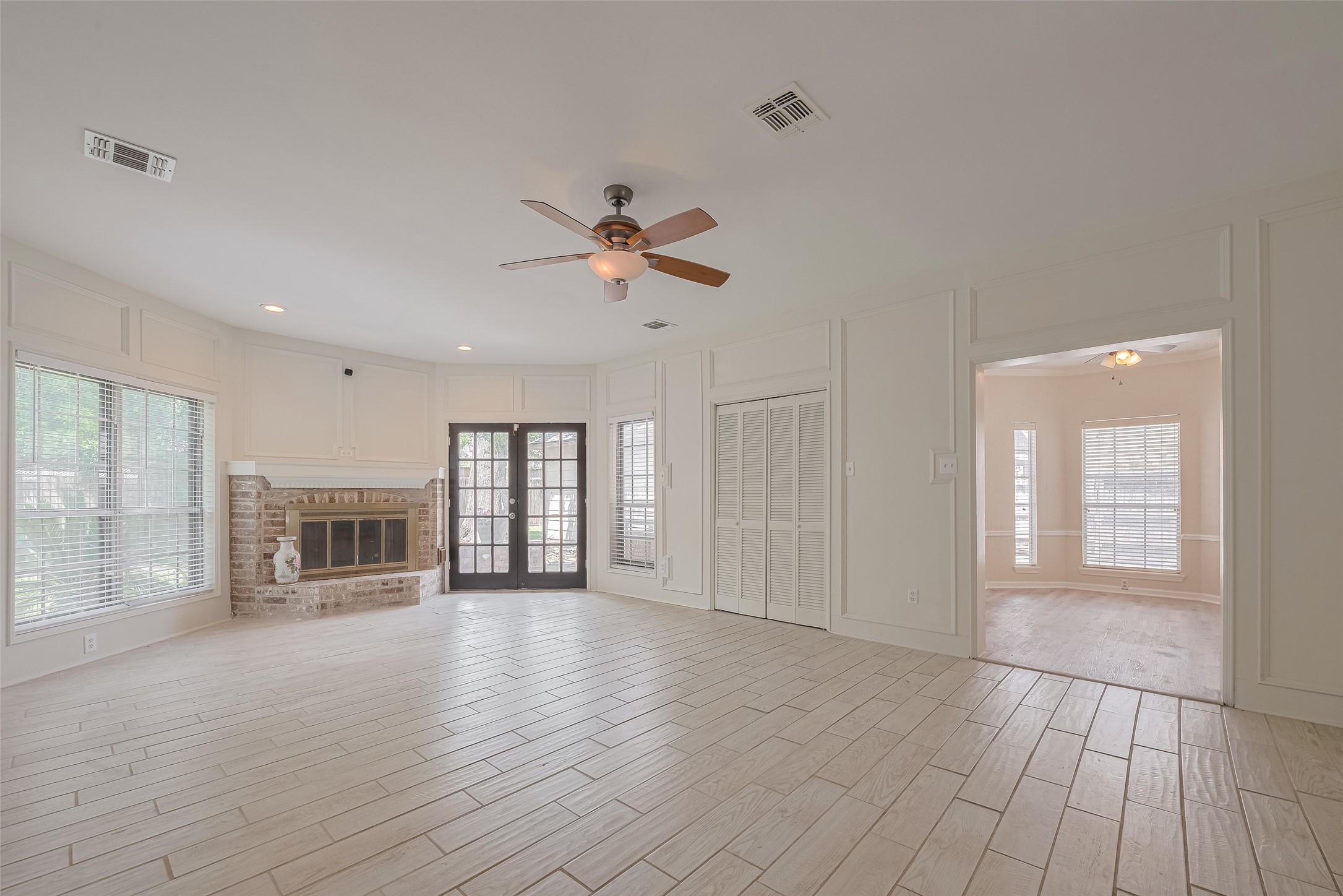 5210 Holly View Drive Houston, TX 77091 - Photo 4 of 31 View #2 of family room with built in wet bar behind shutter doors!