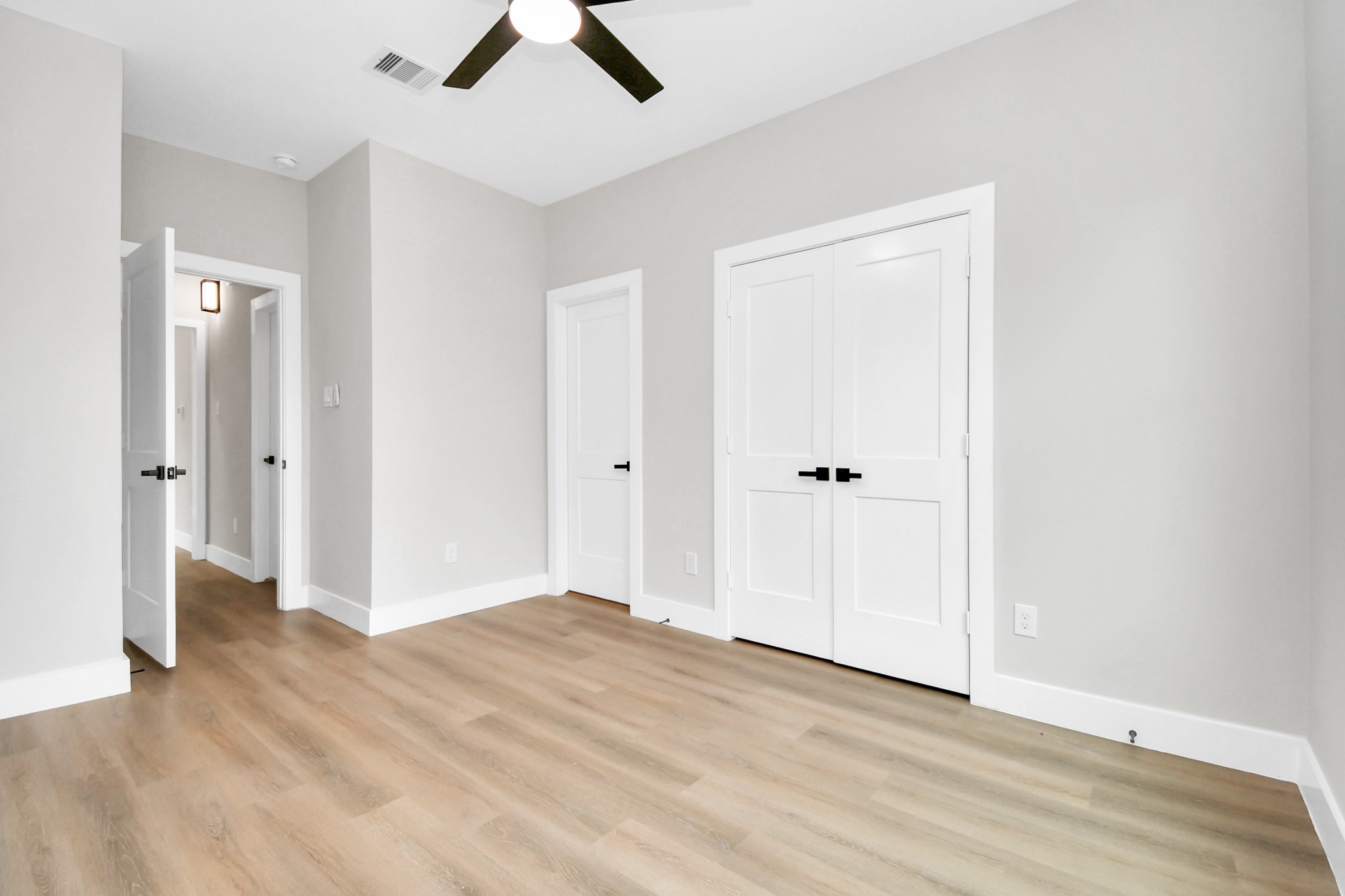 8409 Sunnyhill Street Houston, TX 77088 - Photo 13 of 13 wooden floor in an empty room
