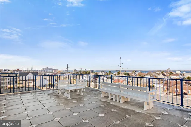 a view of a terrace with chairs