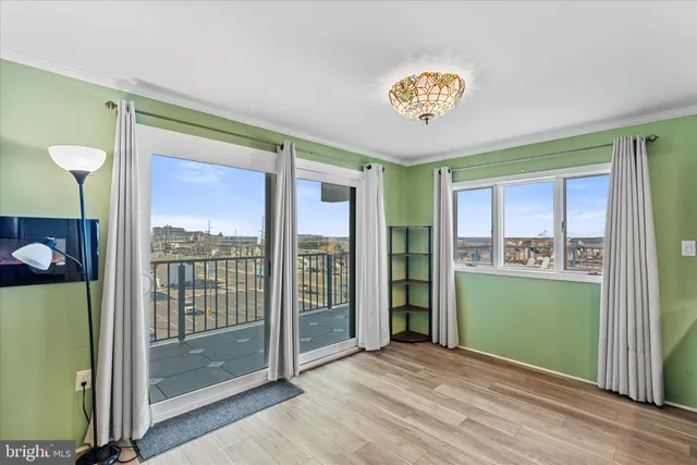 a view of livingroom with furniture and windows