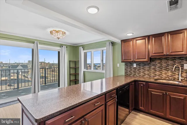 a bedroom with two beds and a window