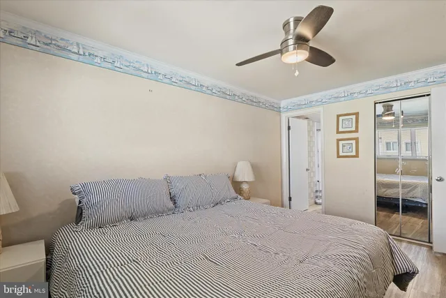 a bathroom with a sink shower and a mirror