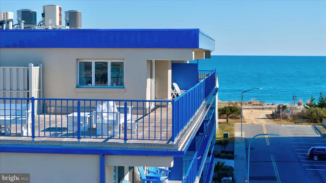 a view of a balcony with chairs