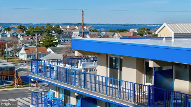 a view of a balcony with chairs