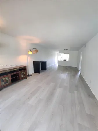 a view of a room with natural light