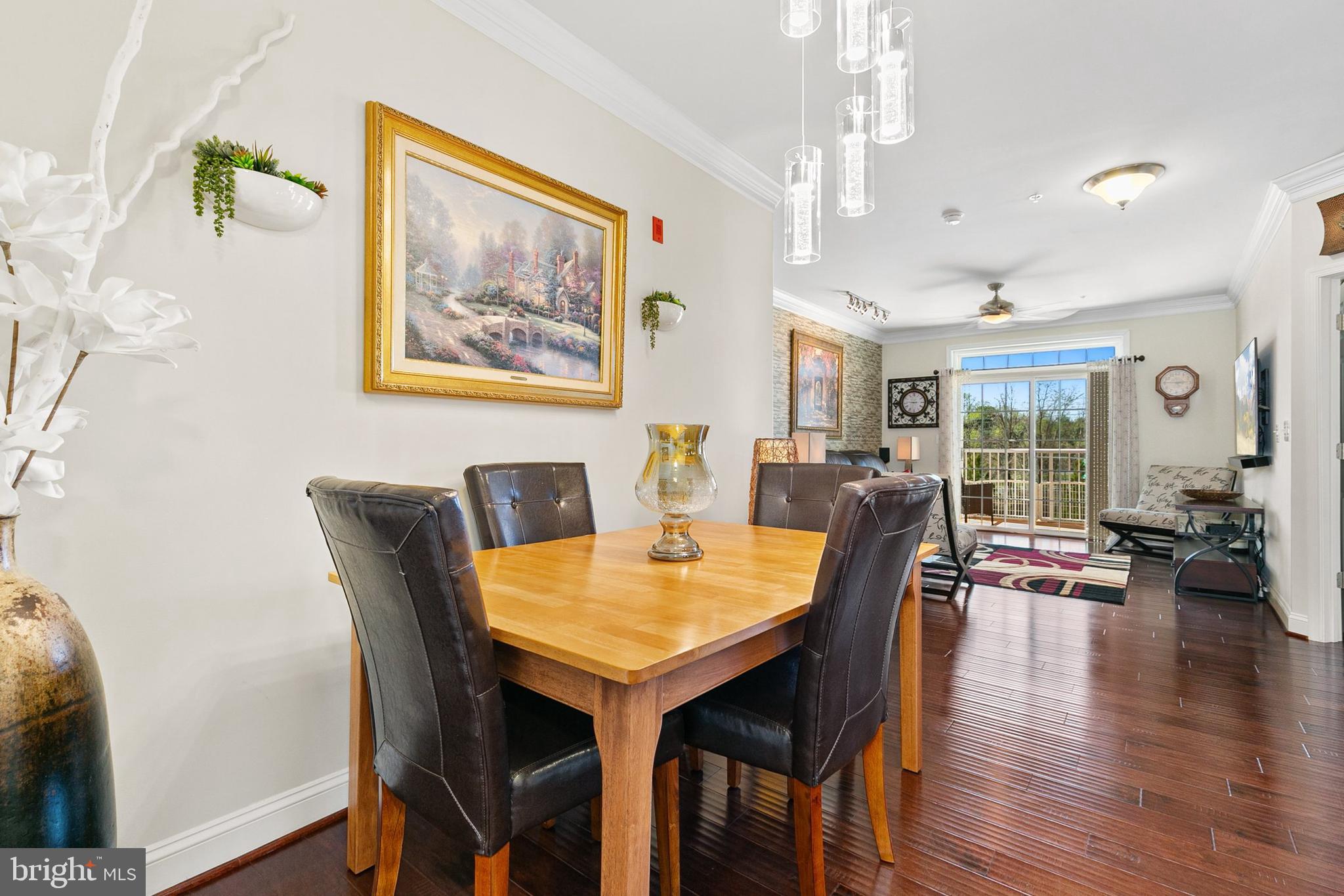 3825 Doc Berlin Drive, Unit 25 Silver Spring, MD 20906 - Photo 13 of 41 a view of a dining room with furniture window and wooden floor