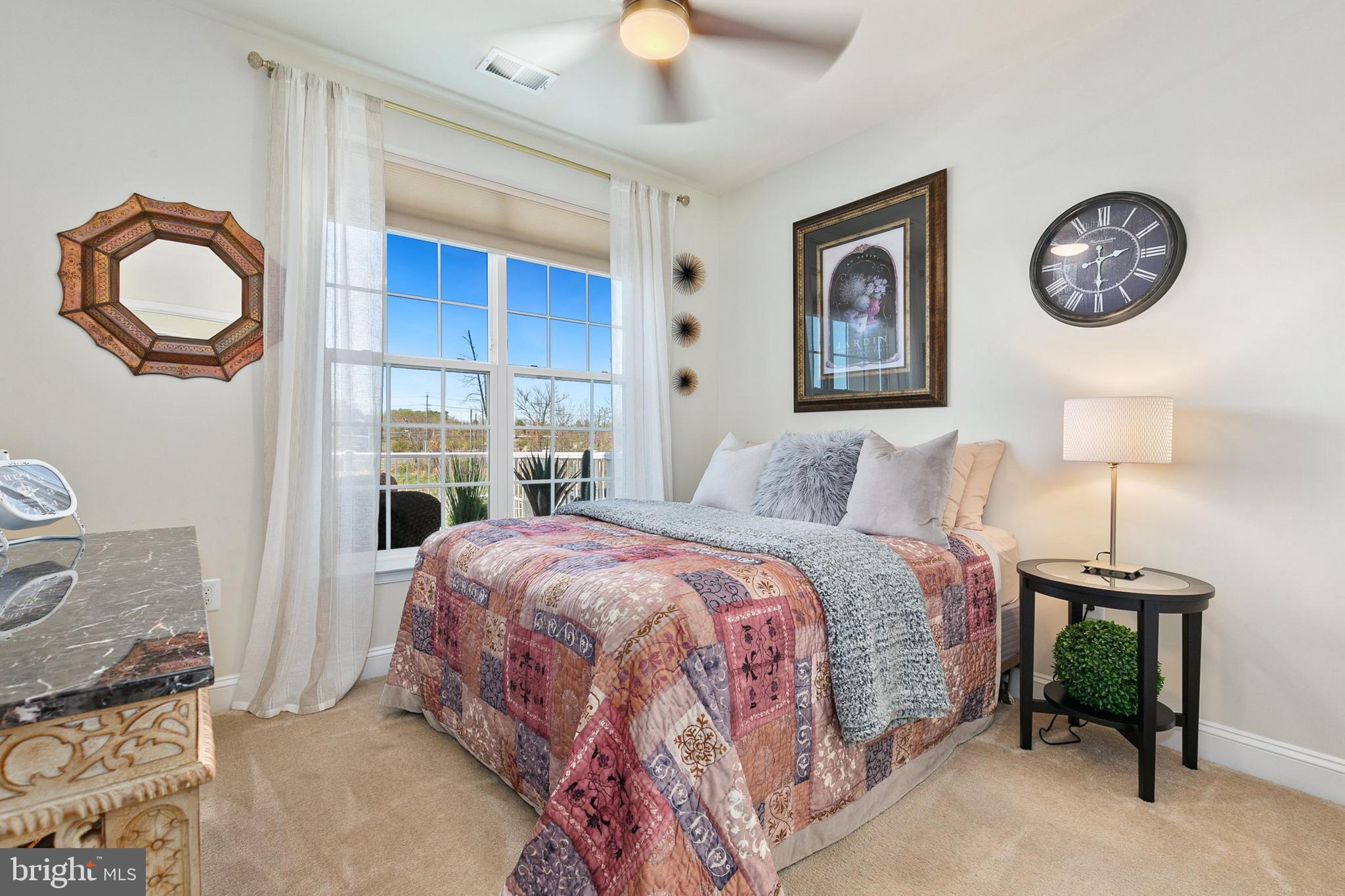 3825 Doc Berlin Drive, Unit 25 Silver Spring, MD 20906 - Photo 15 of 41 a bedroom with a bed and a window