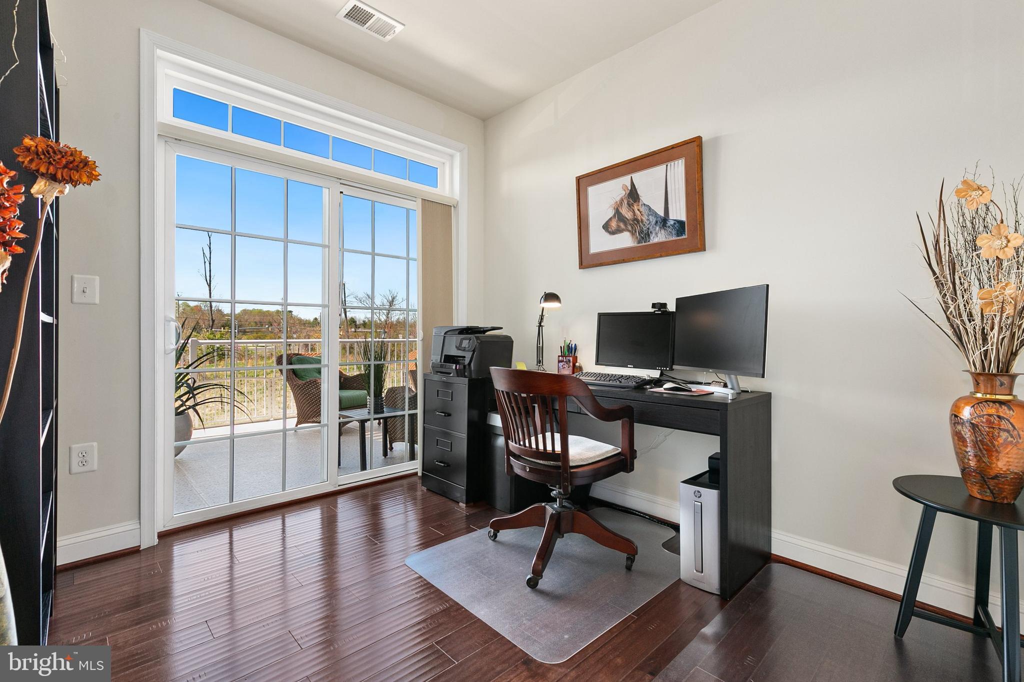 3825 Doc Berlin Drive, Unit 25 Silver Spring, MD 20906 - Photo 20 of 41 a view of a workspace with furniture and a window