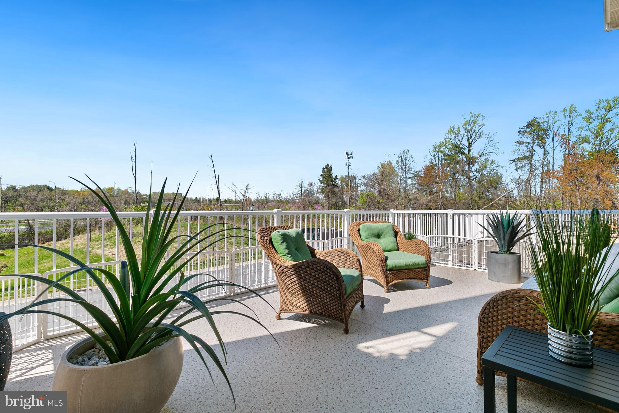 3825 Doc Berlin Drive, Unit 25 Silver Spring, MD 20906 - Photo 25 of 41 a view of a balcony with chairs