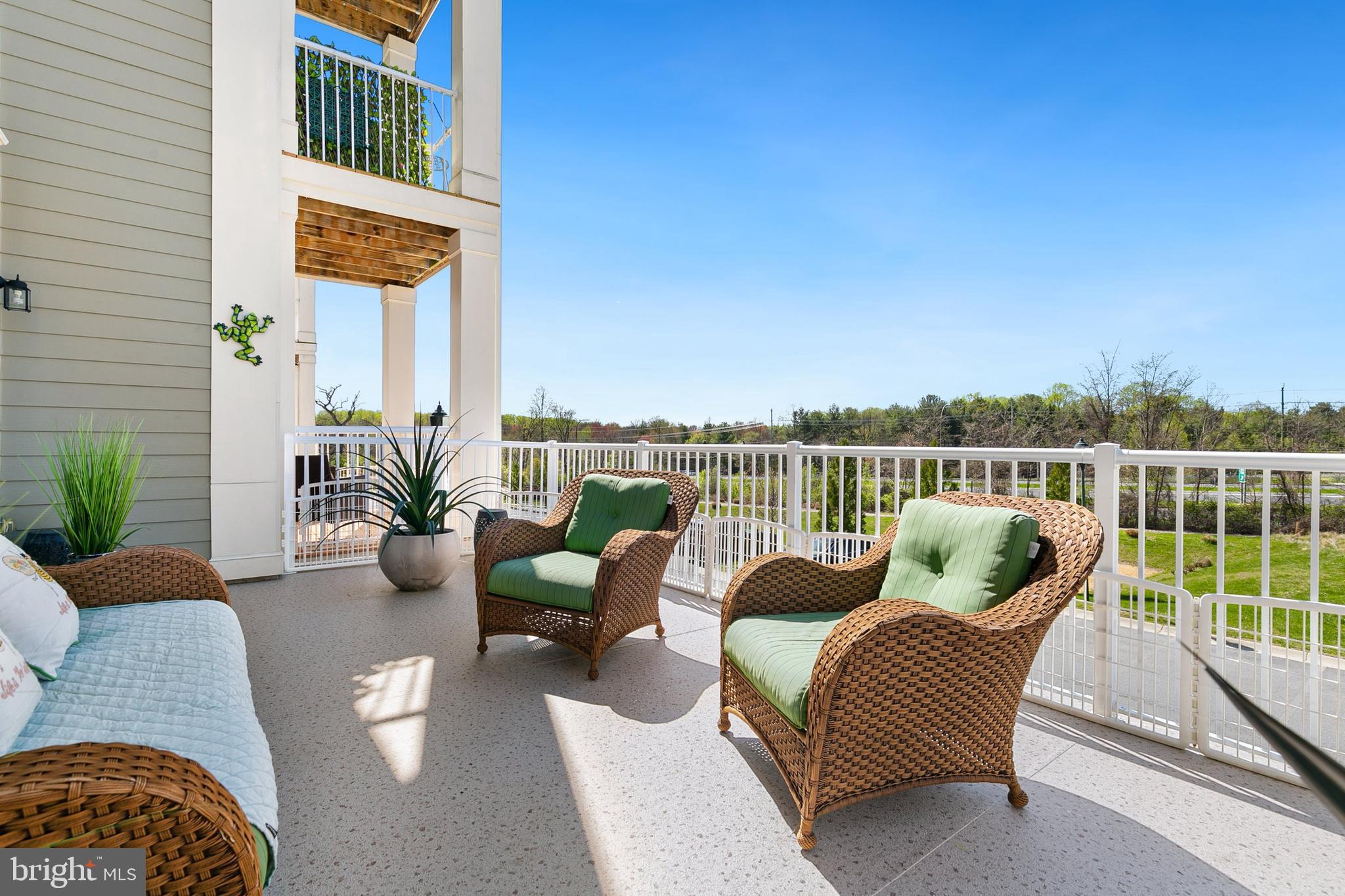 3825 Doc Berlin Drive, Unit 25 Silver Spring, MD 20906 - Photo 27 of 41 a roof deck with couches and potted plants