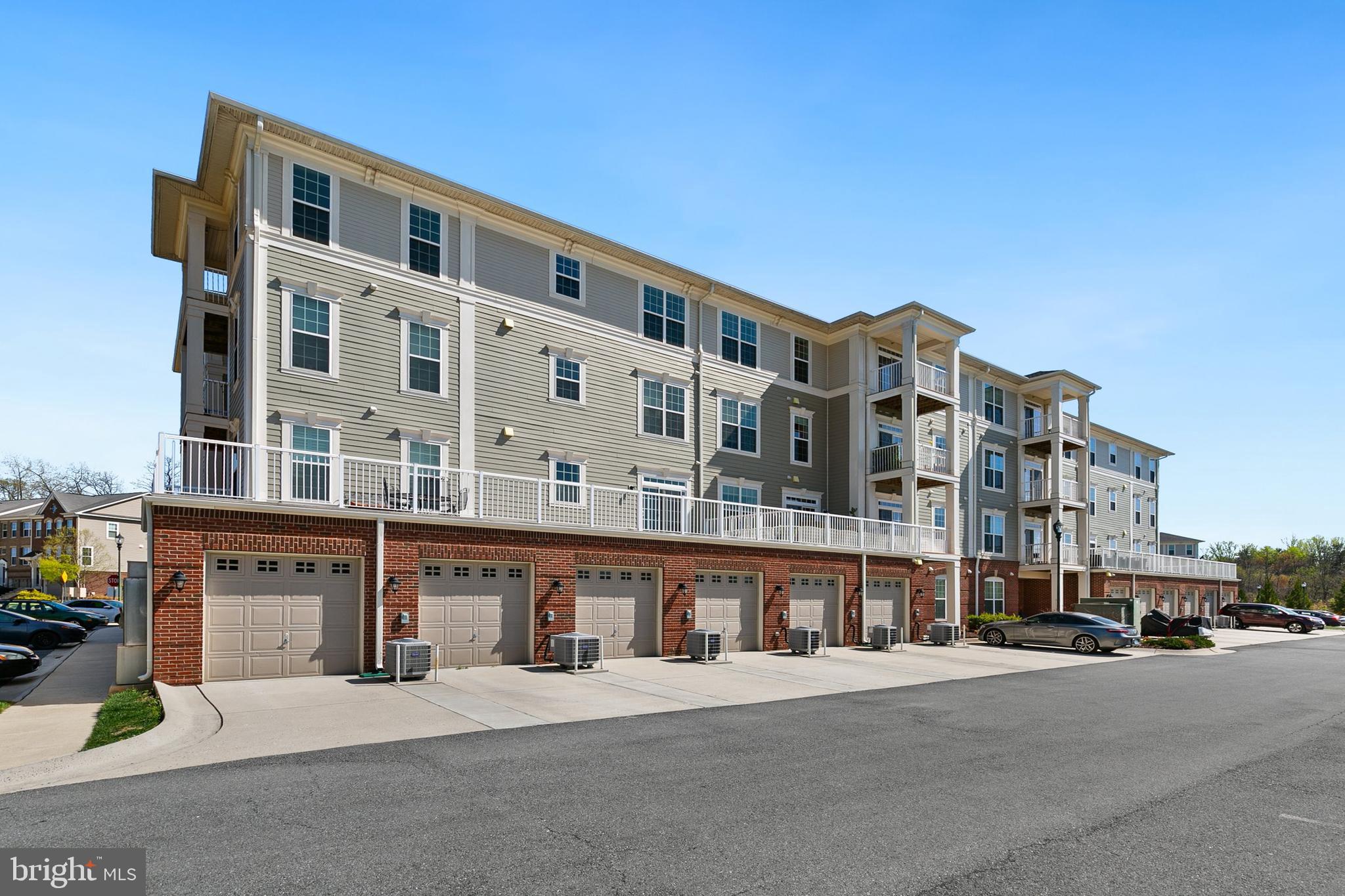 3825 Doc Berlin Drive, Unit 25 Silver Spring, MD 20906 - Photo 29 of 41 front view of a building with a street