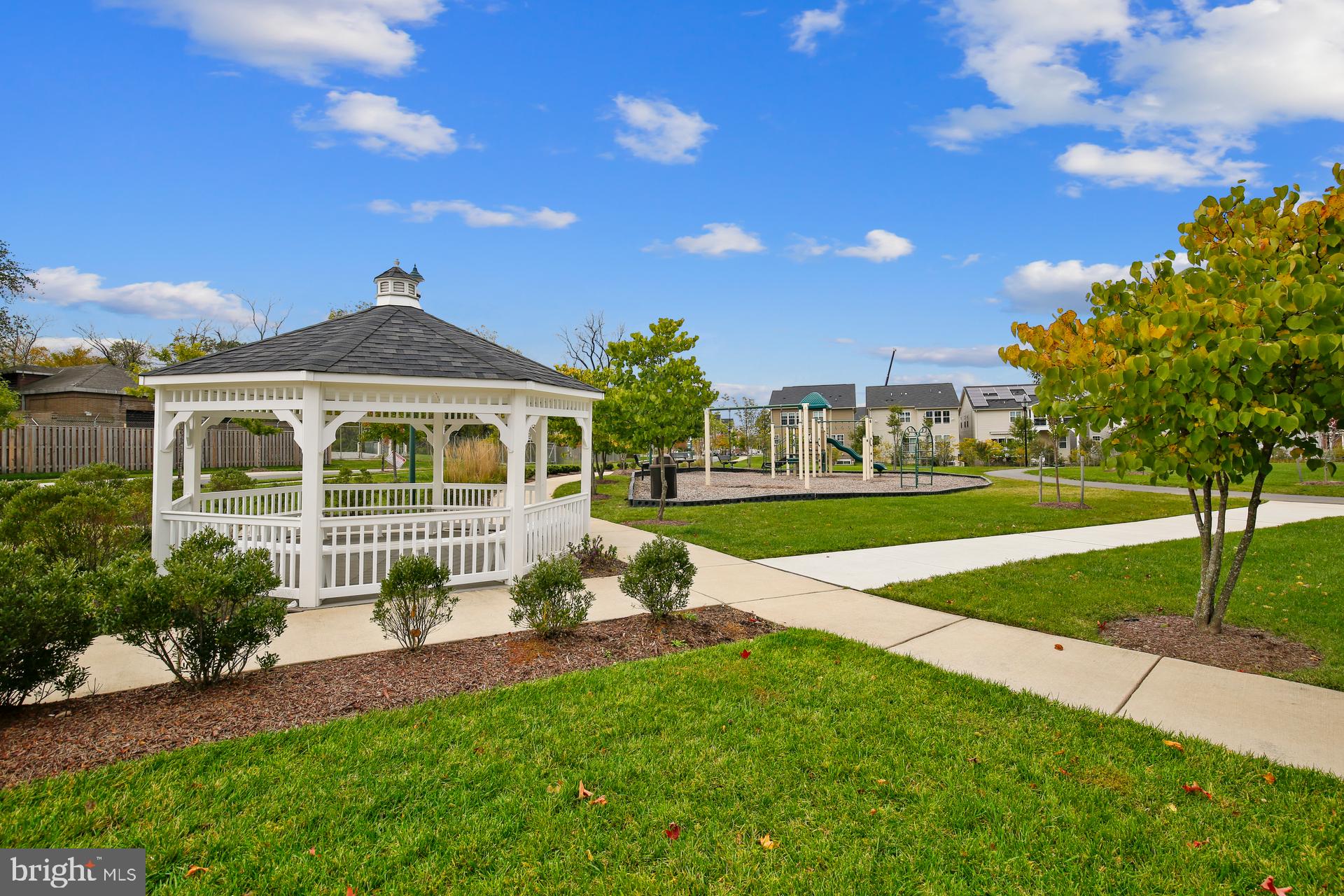 3825 Doc Berlin Drive, Unit 25 Silver Spring, MD 20906 - Photo 31 of 41 a front view of a house with garden