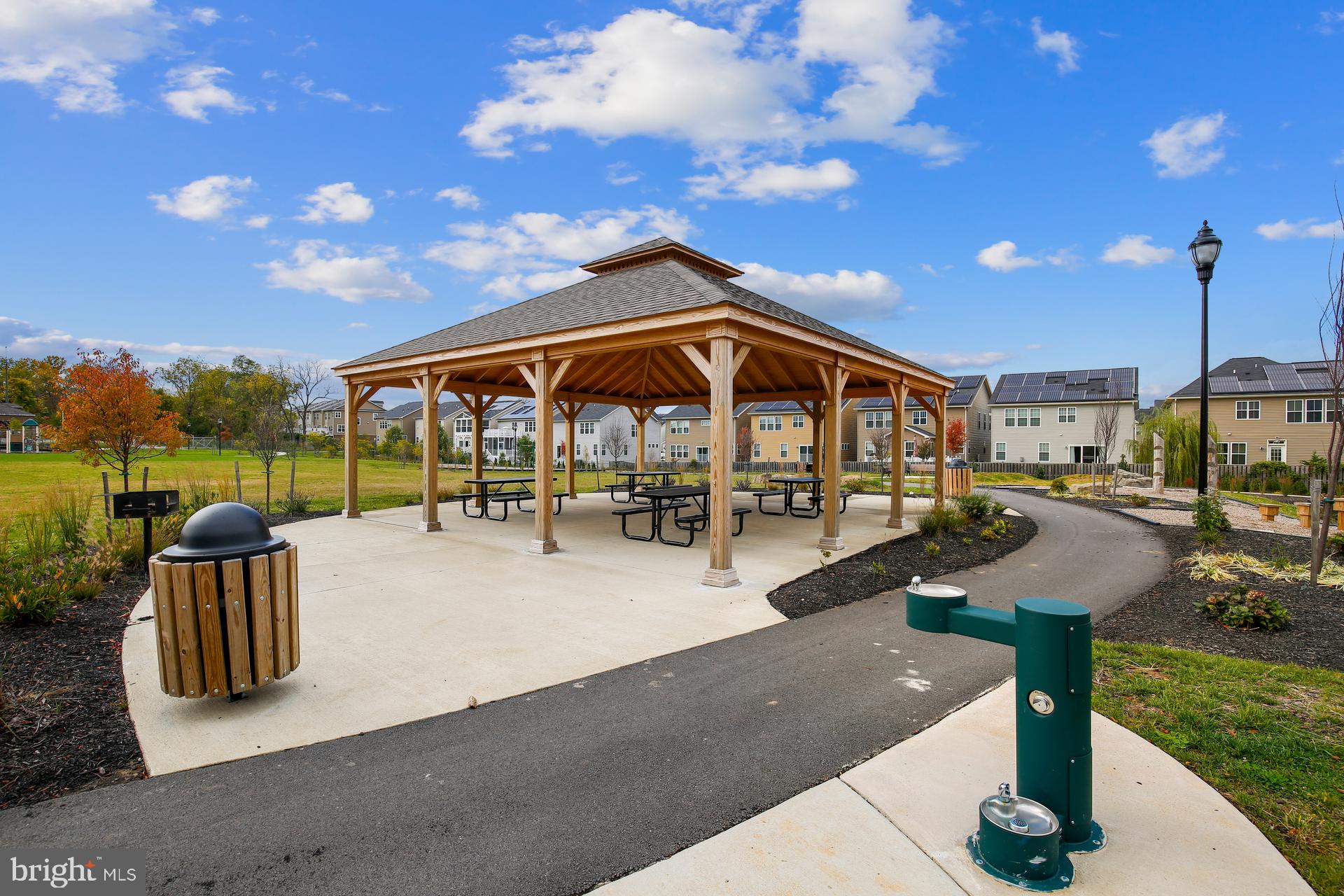 3825 Doc Berlin Drive, Unit 25 Silver Spring, MD 20906 - Photo 32 of 41 a view of swimming pool with outdoor seating and plants